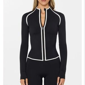 Nama “Body Butter Contrast Jacket”